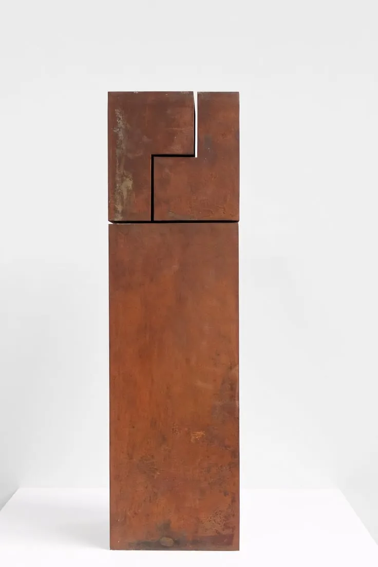 Angular contemporary sculpture in rust-coloured metal