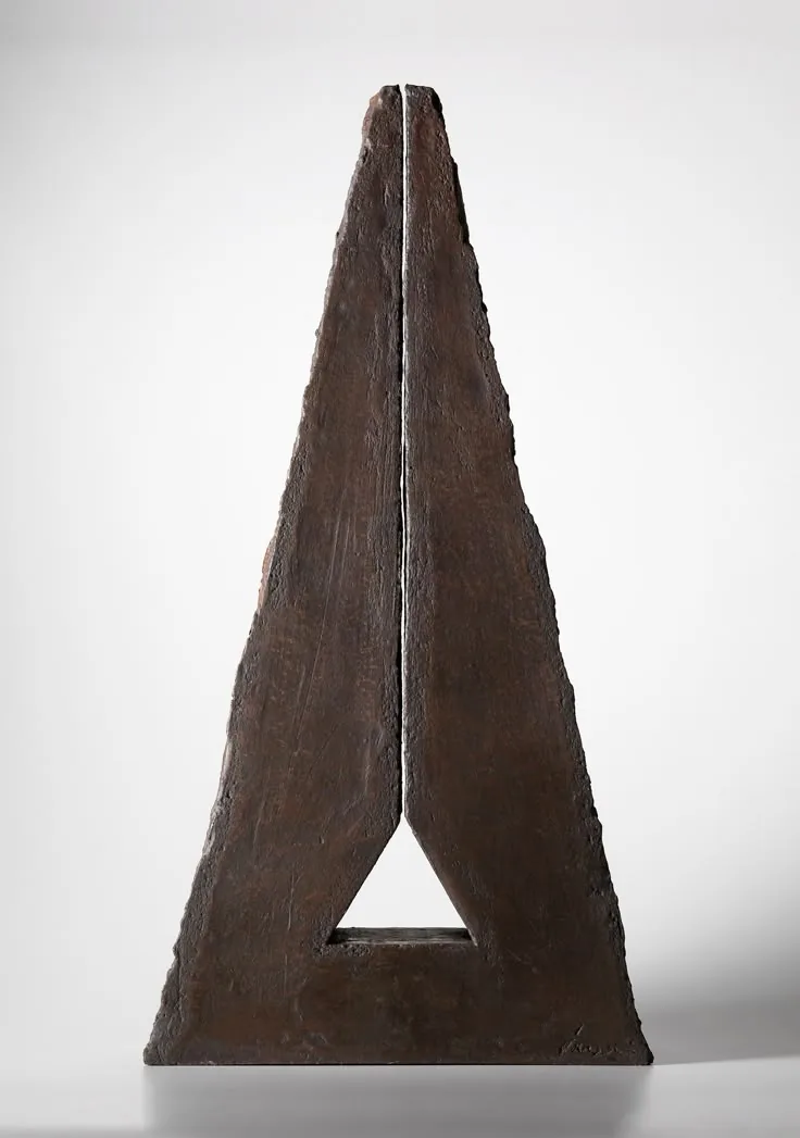 Triangular contemporary sculpture with an open centre