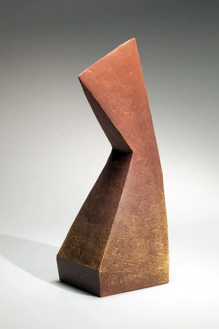 Geometric contemporary sculpture in weathered metal
